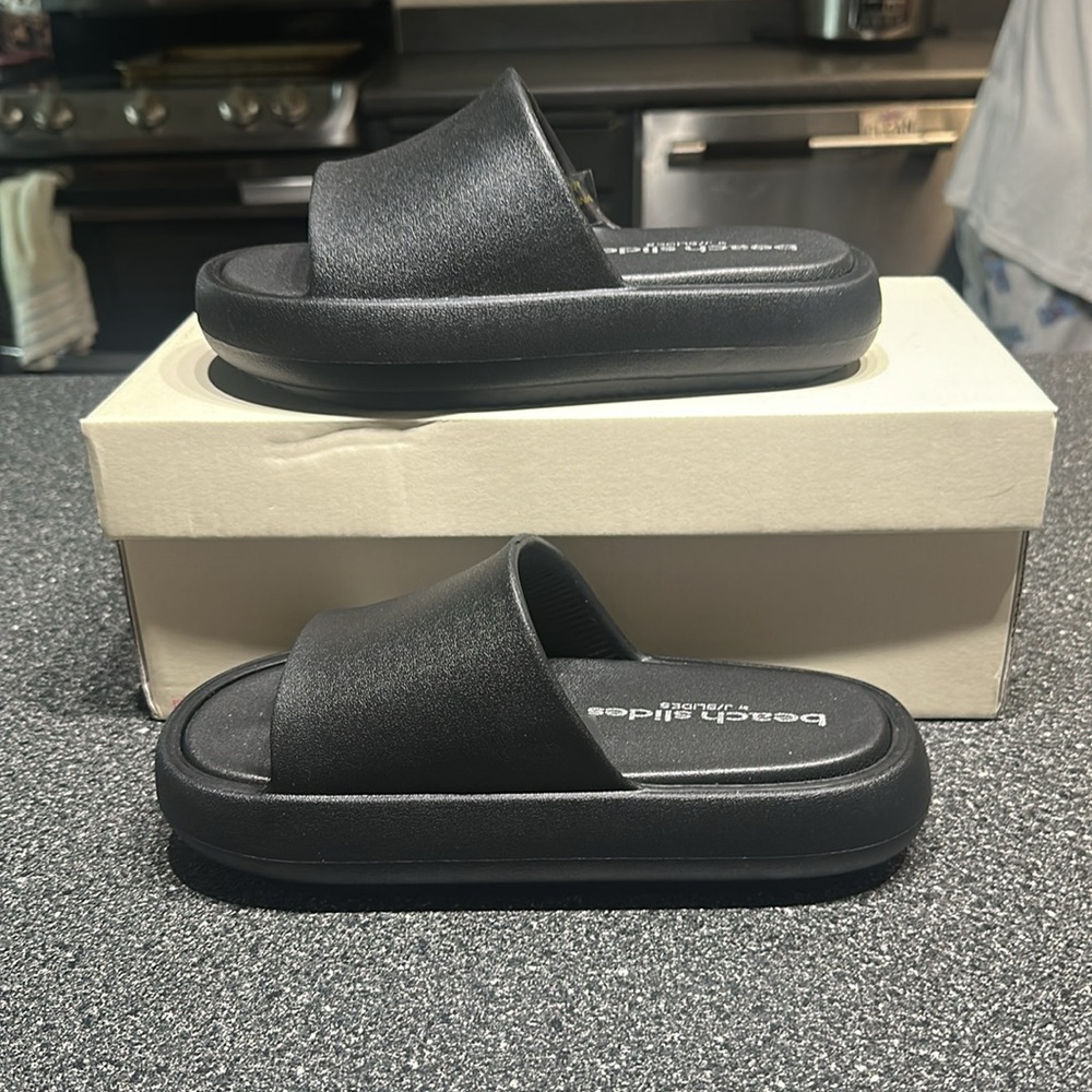Brand new beach slides by J slides! Women’s size 7M in black
